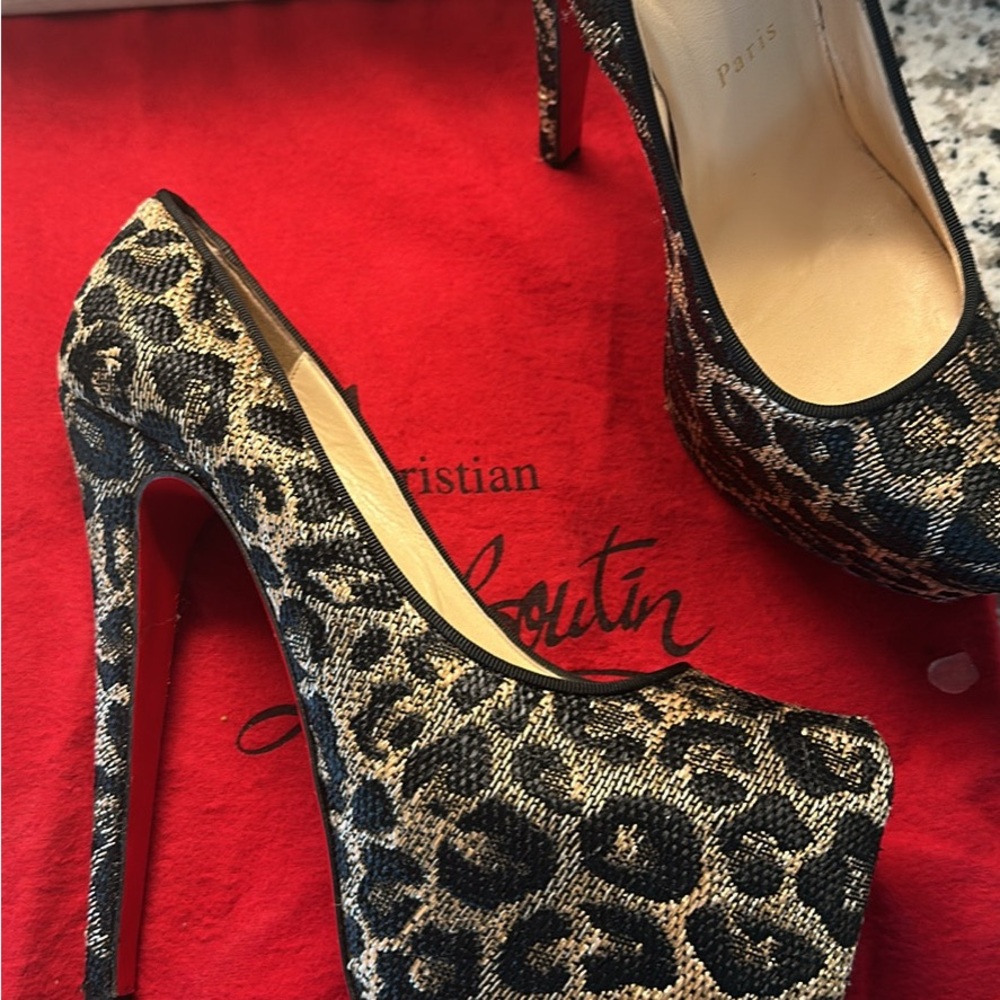 Christian Louboutin Animal Print Heels with Red Soles
